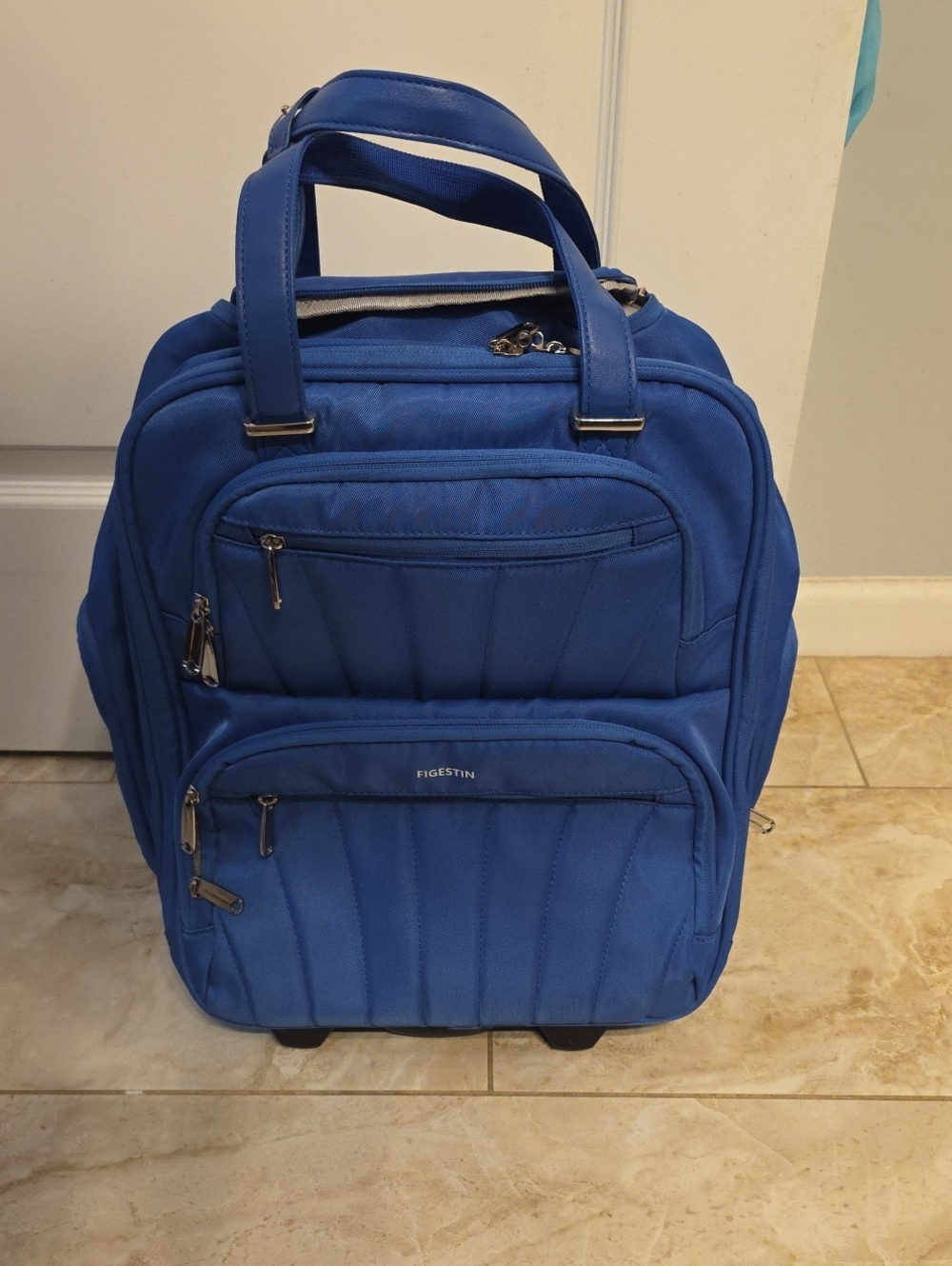 Blue Carry-On Travel Bag With Two Wheels